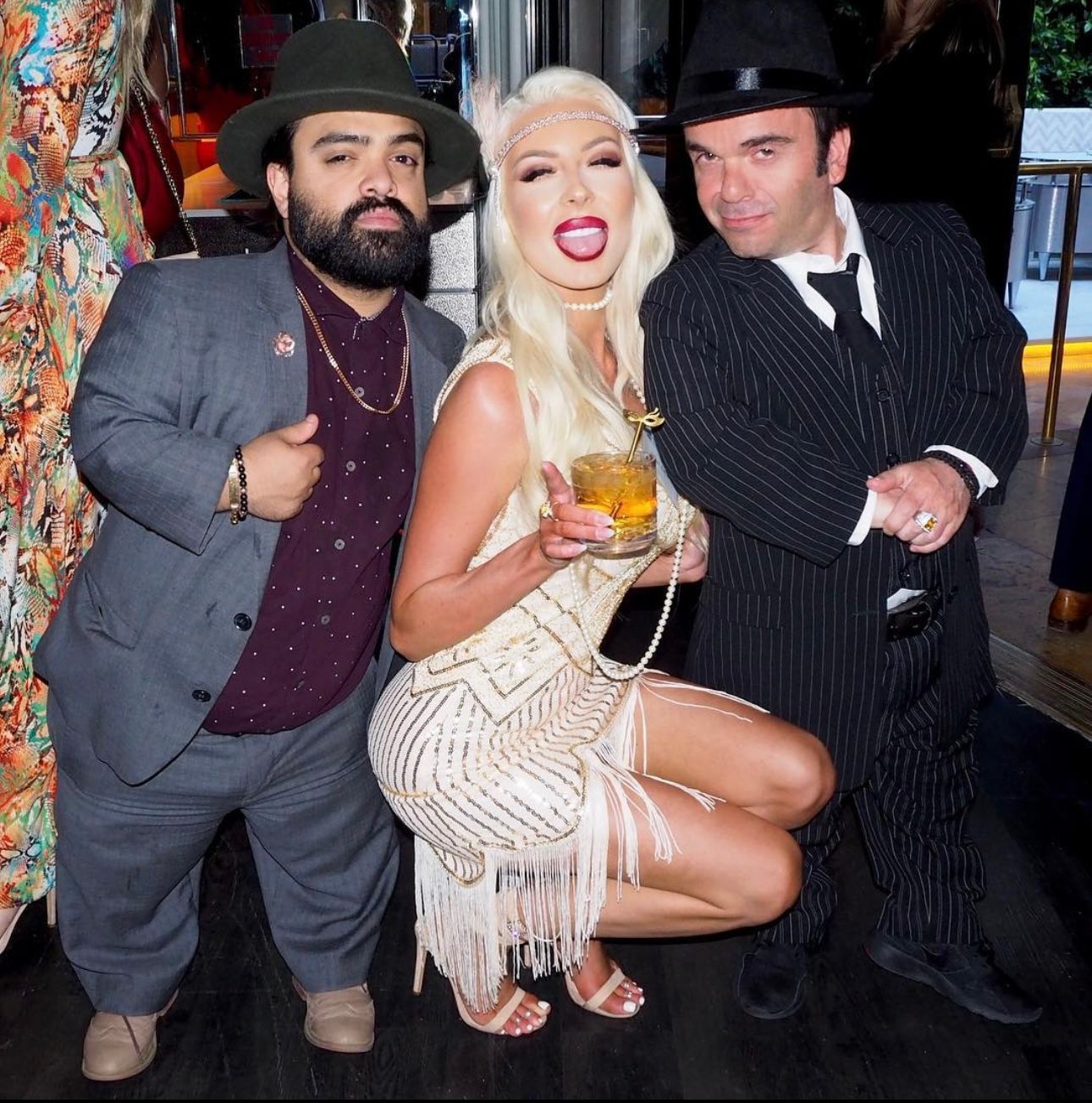 Corporate talent and event atmosphere model poses for the cameras at a corporate event for Mass Torts Las Vegas at the Wynn.