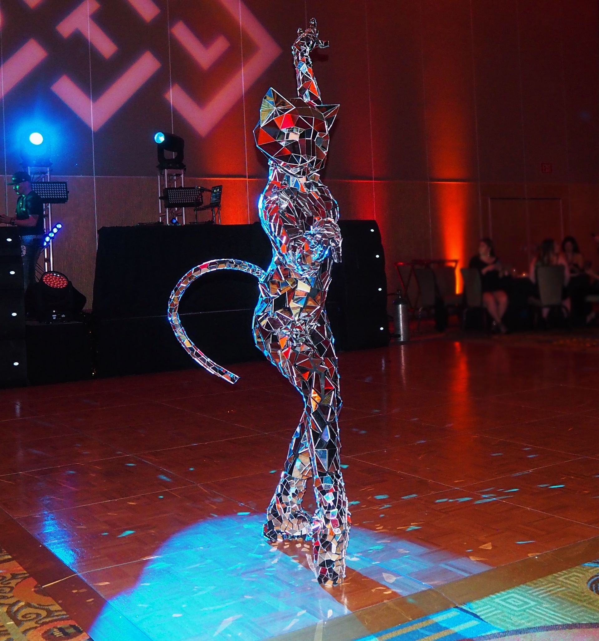 Roaming costumed mirror characters add ambiance to your corporate event.