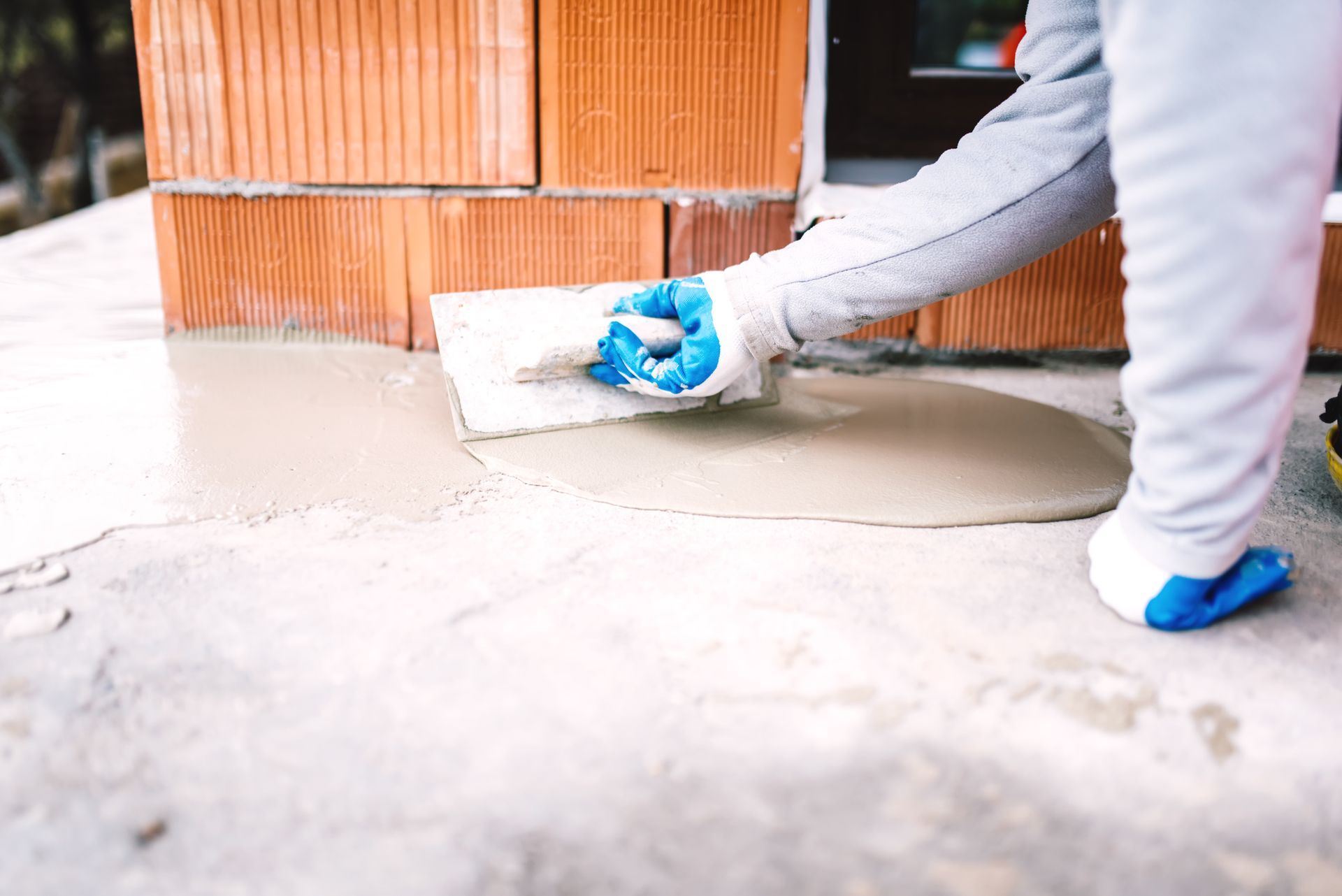 Expert from Chimney Repair & Fireplace Service working on a brick masonry project in Seattle, WA