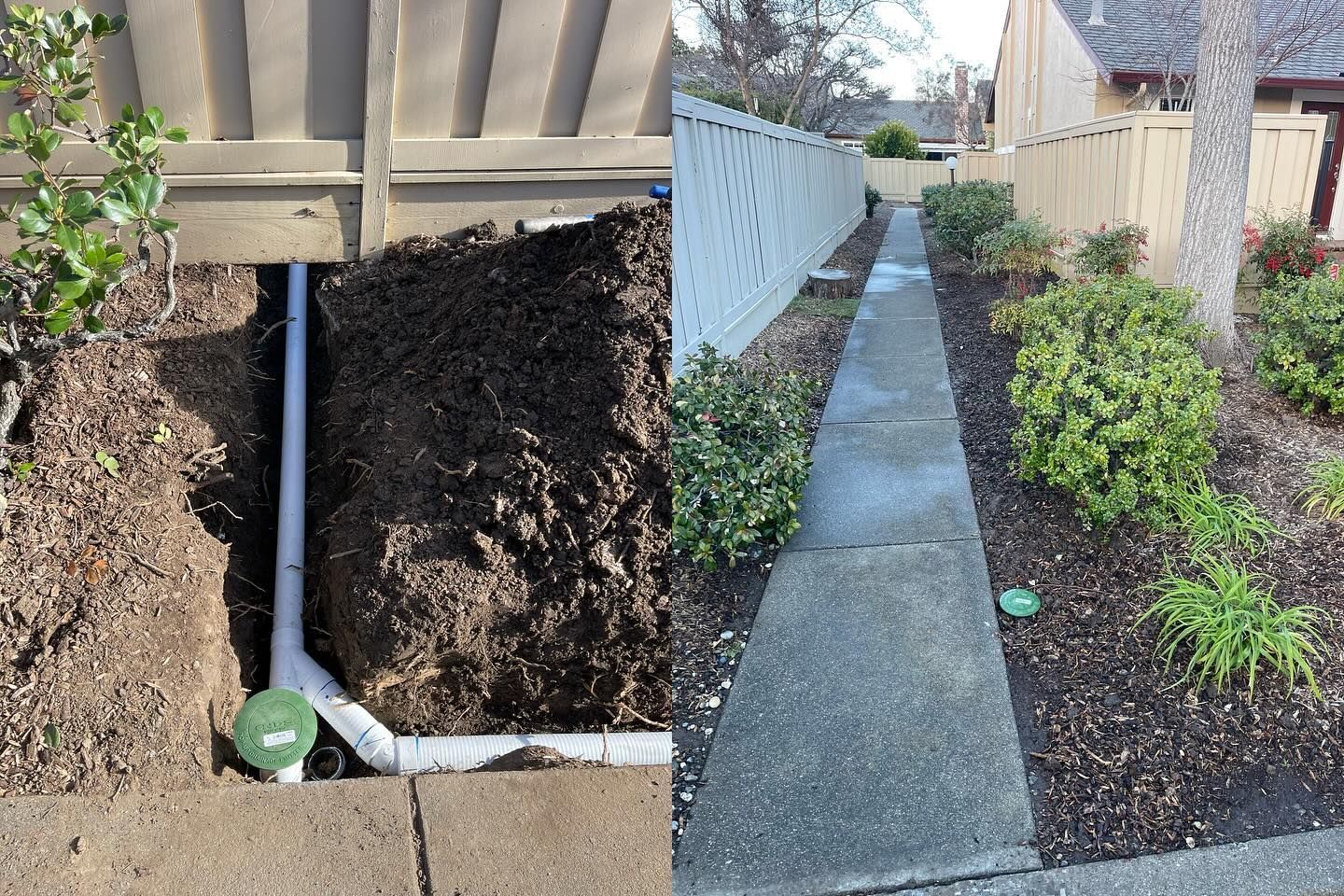 Drainage pipe construction next to a sidewalk and fence.