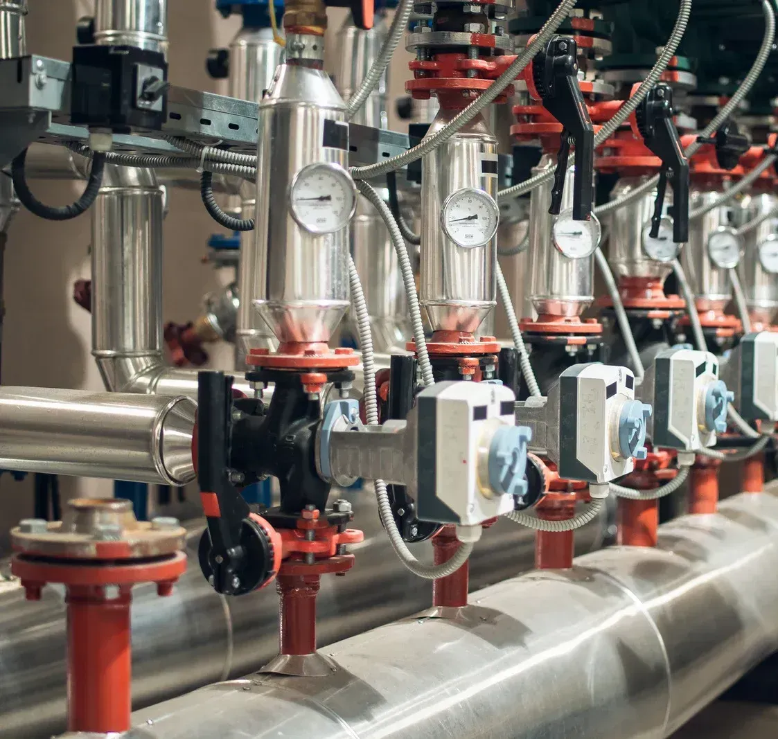 A row of pipes and valves with the number 2 on them