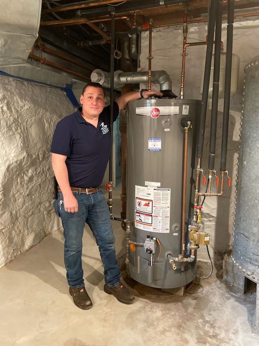 Company owner standing near the water heater