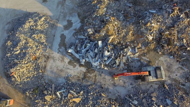 Aerial view of abandoned site demolition and hazardous debris cleanup for compliant environmental closure