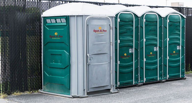 Porta Toilets Set up In a Parking Lot — White Marsh, MD — Spot A Pot