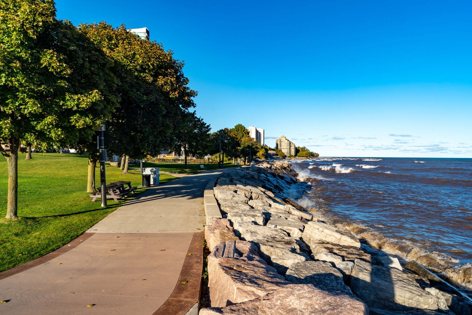A walkway along the shore of a body of water