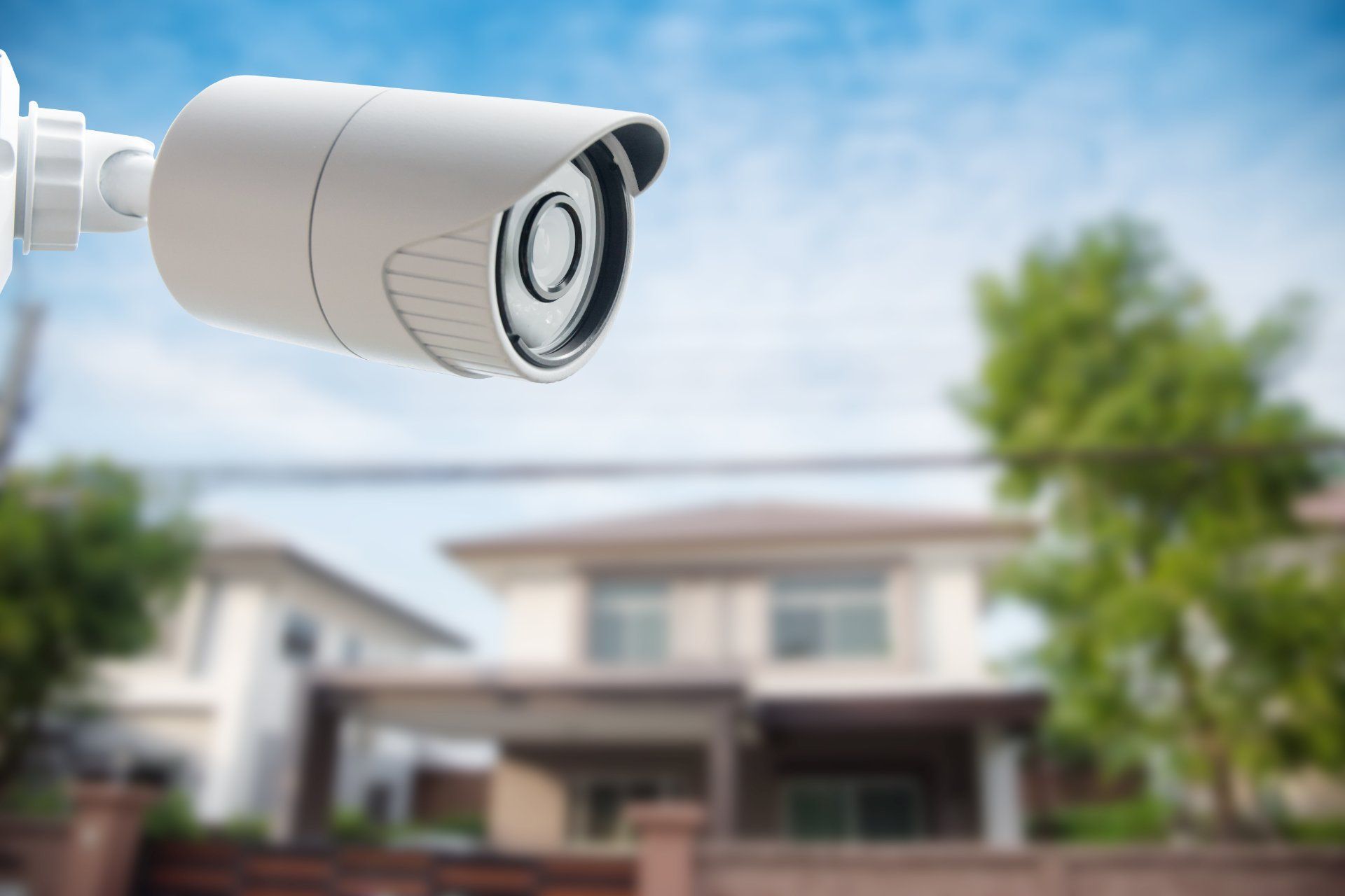 An exterior security camera monitoring the outside of a short-term rental property.