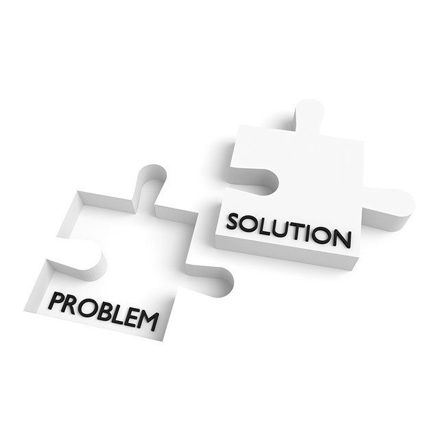 A puzzle with the words solution and problem on it.
