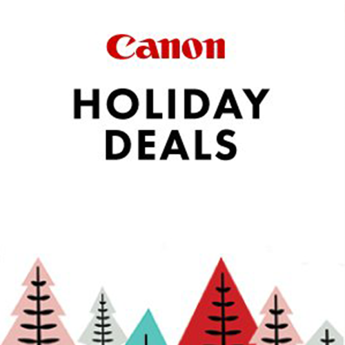 An advertisement for canon holiday deals with trees in the background