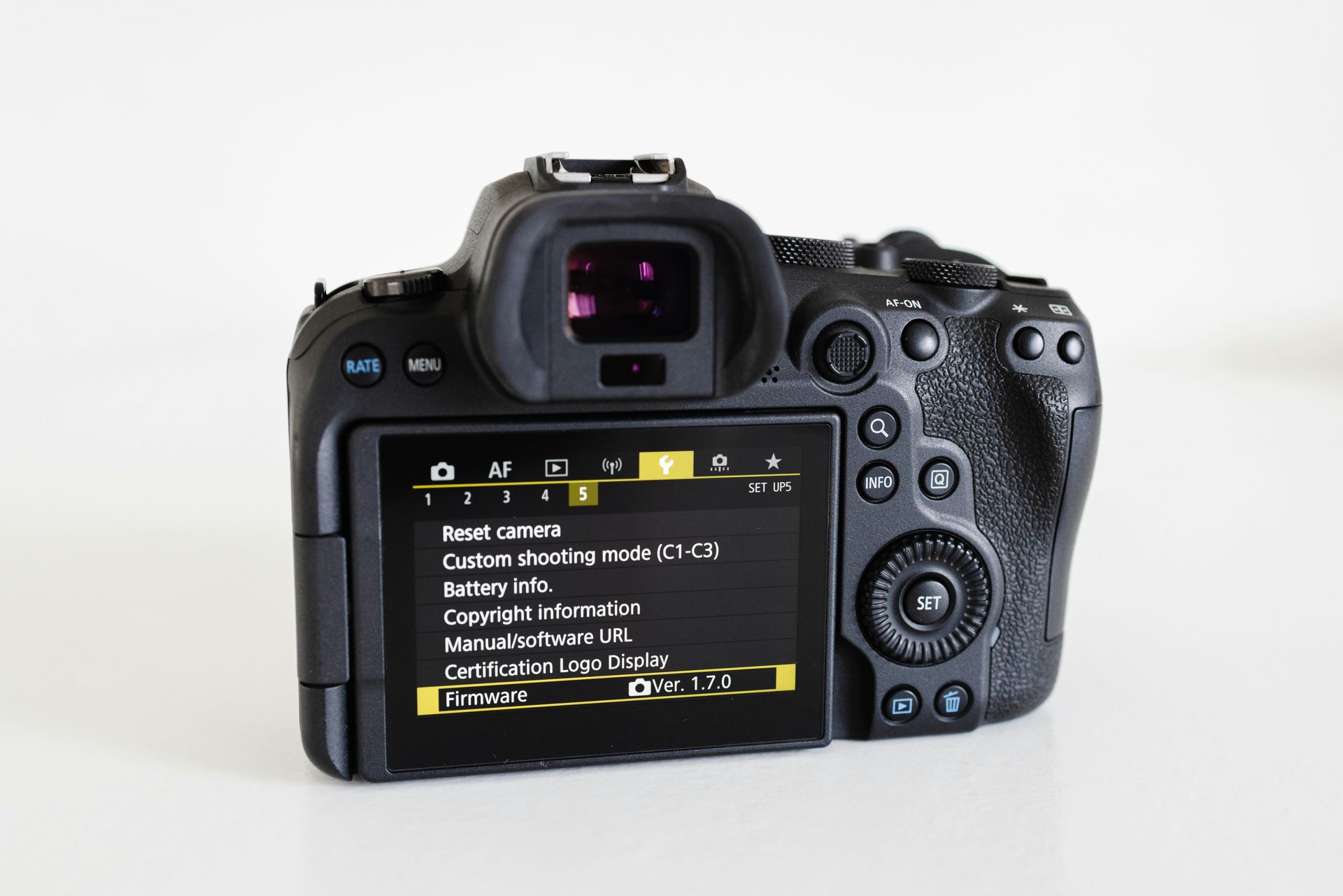 The tamron logo is on a blue background.