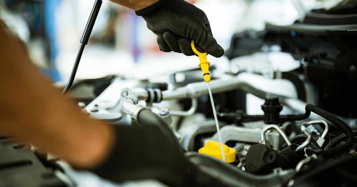 a mechanic doing an oil change in Concord NC
