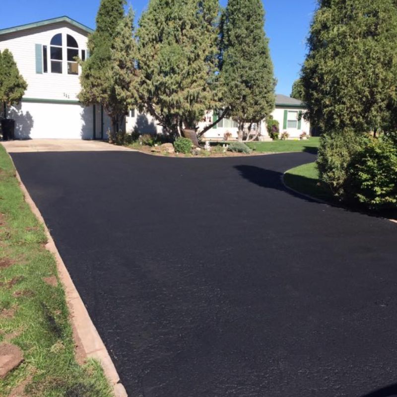 Asphalt driveway repair and restoration for our satisfied client in Austin, TX.