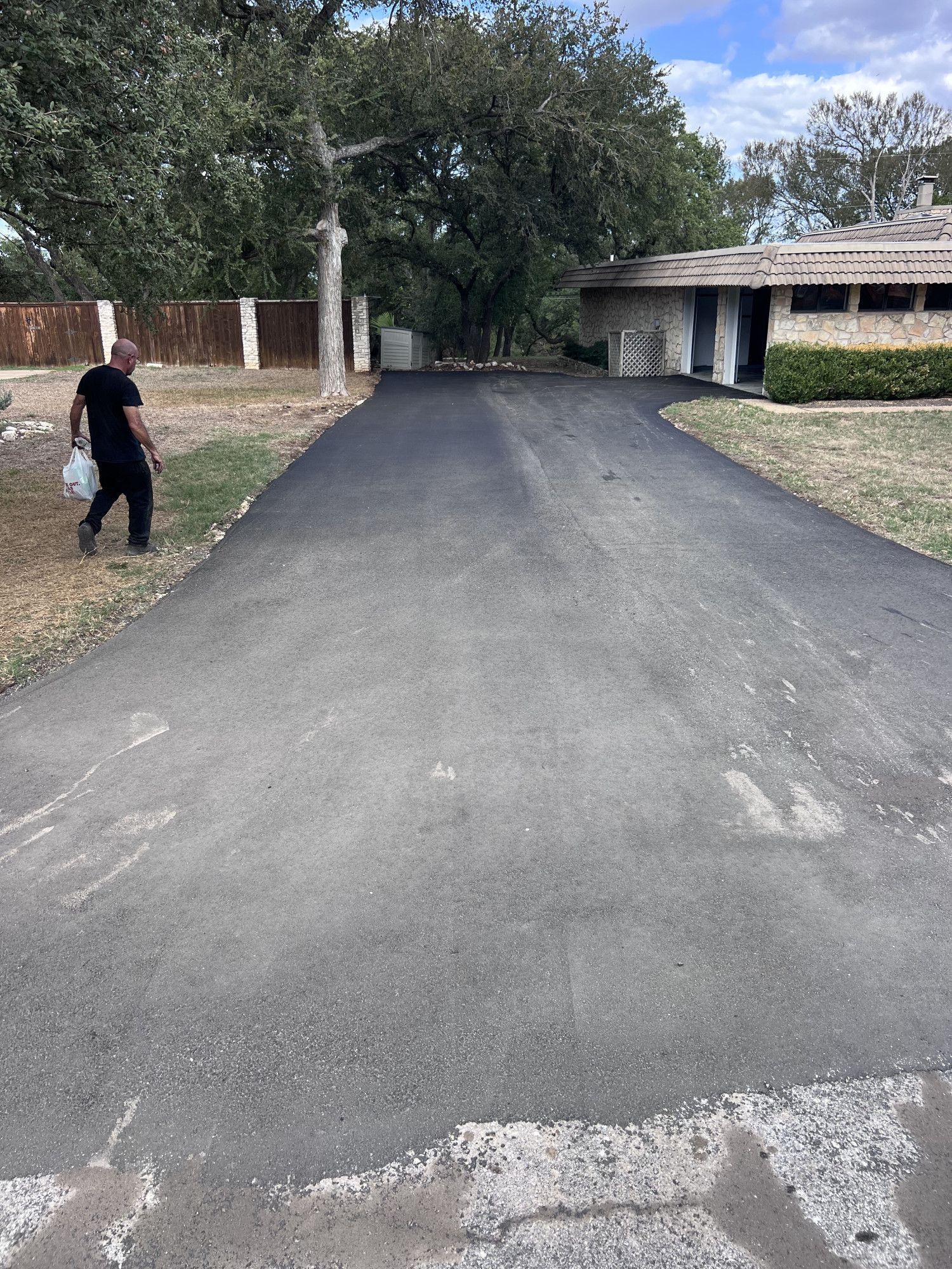 After Image of our client's driveway restoration process in Austin, TX.