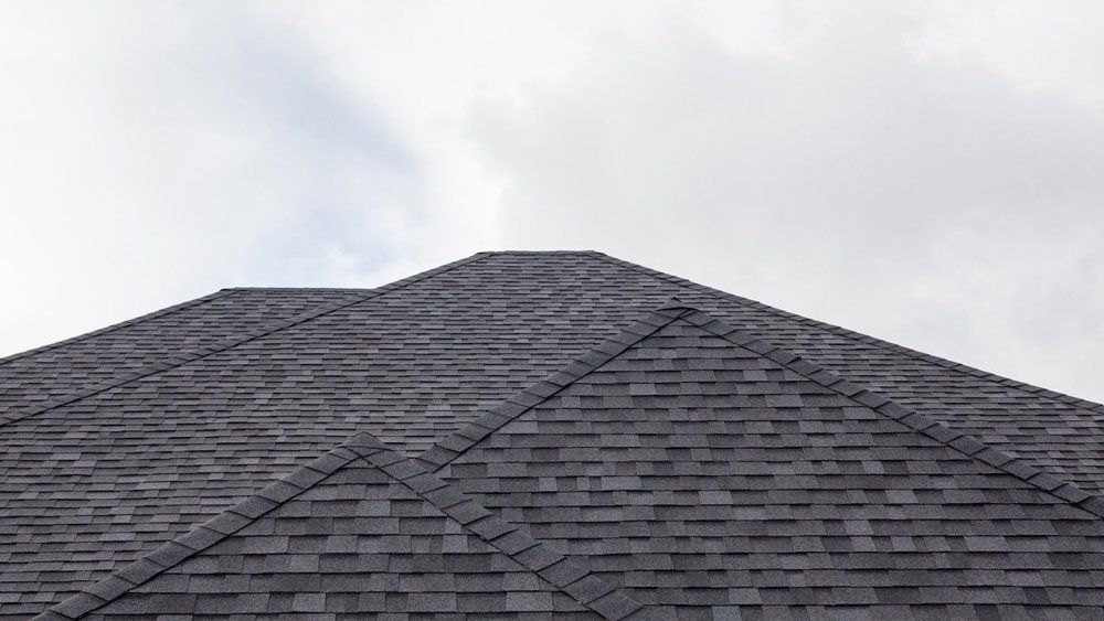 Gray Tile Roof — Georgetown, TX — Hall’s Roofing & Sheet Metal