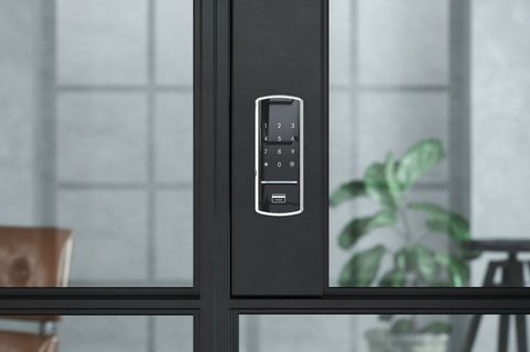 A close up of a door with keys in it.