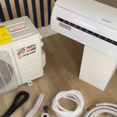 A white air conditioner with the word everwell on it