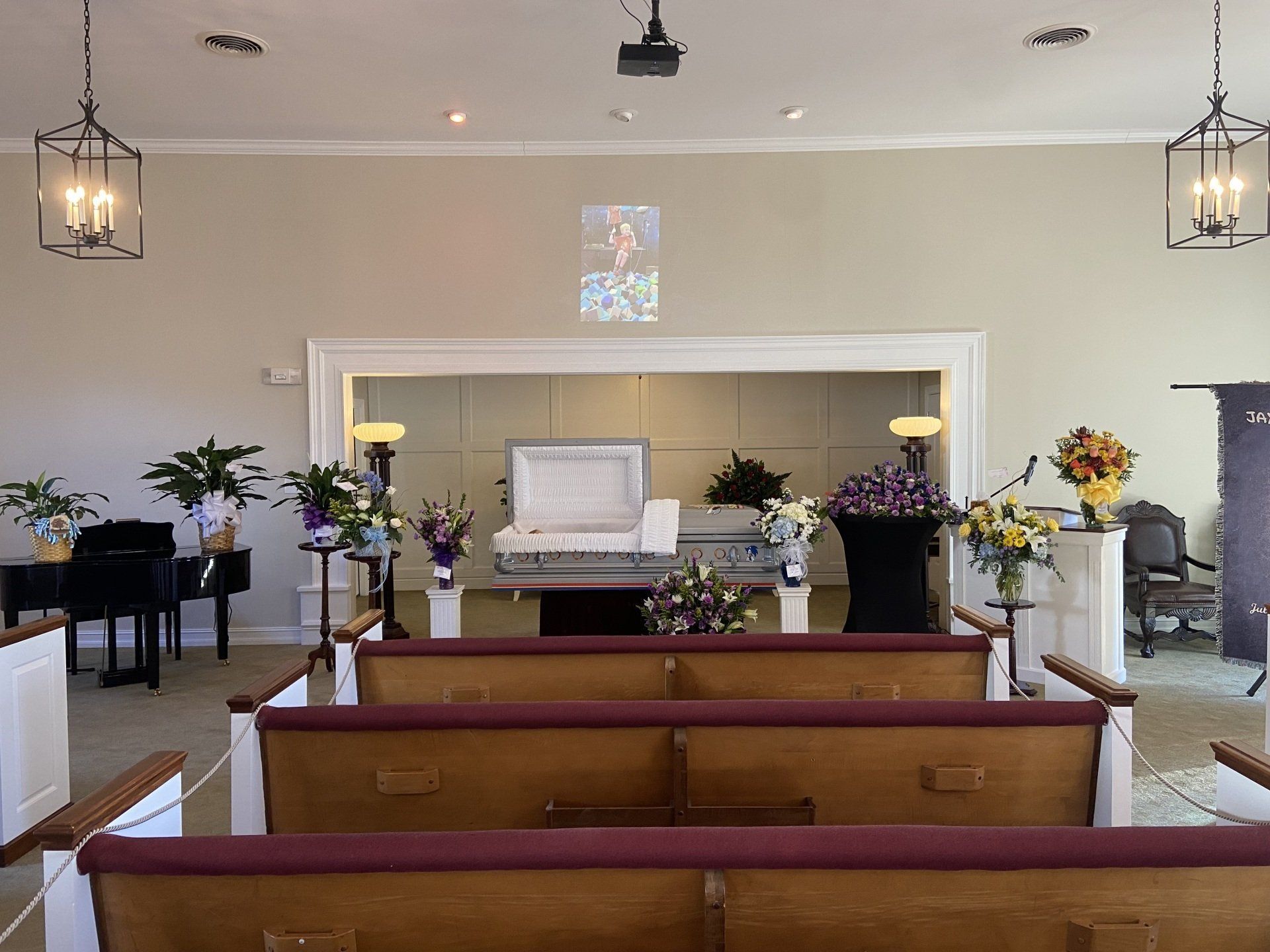 There is a coffin in the middle of the church.