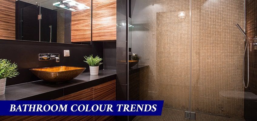 A bathroom with a sink and a walk in shower.