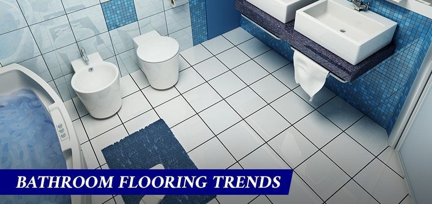 A bathroom with blue and white tiles and the words bathroom flooring trends