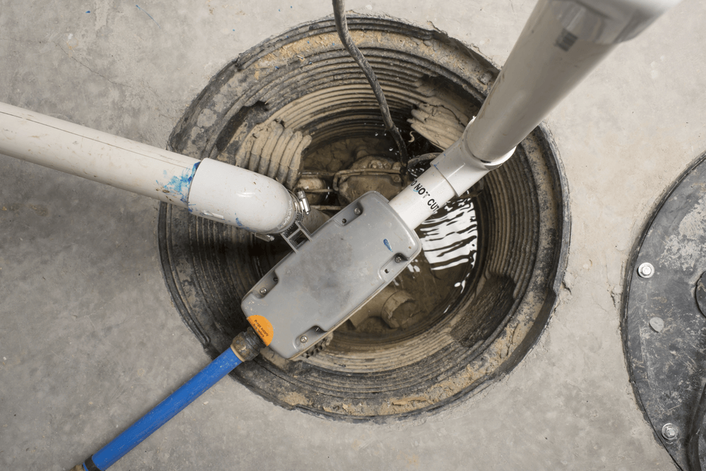 Sump pump in basement. Western Wayne County, Michigan.  - Restoration 1 of Western Wayne County