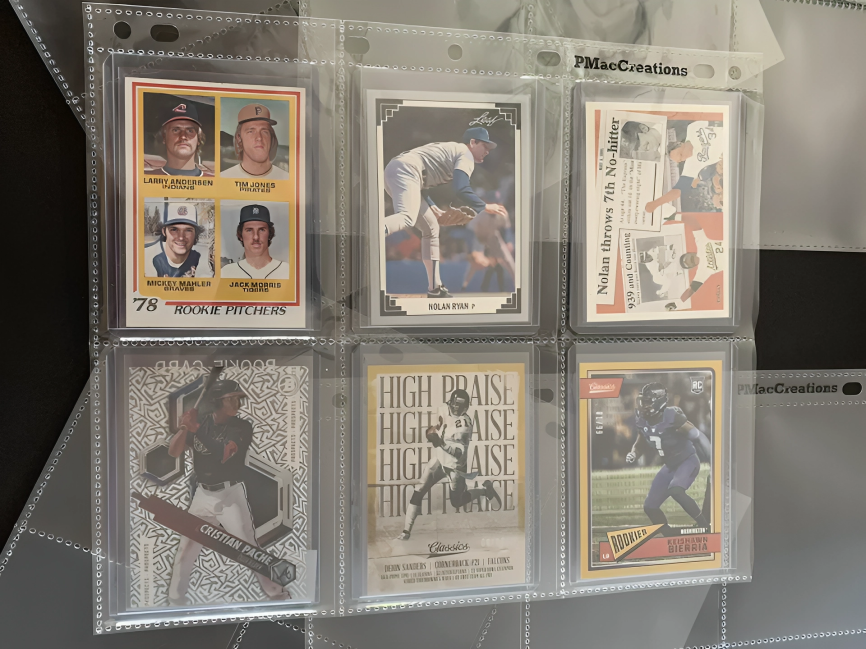 A bunch of baseball cards are sitting on a table