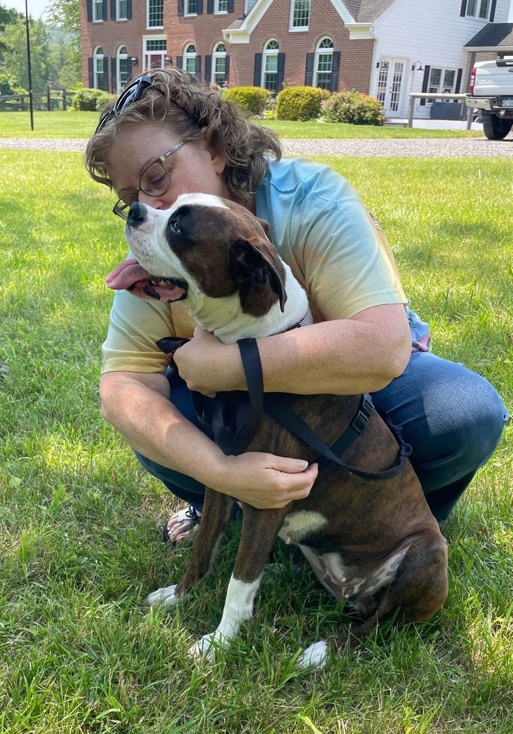 Dixie getting a hug from mom