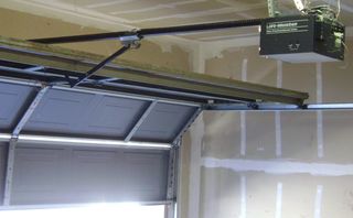 sensored custom made garage door supplied by the friendly installer in Carrara
