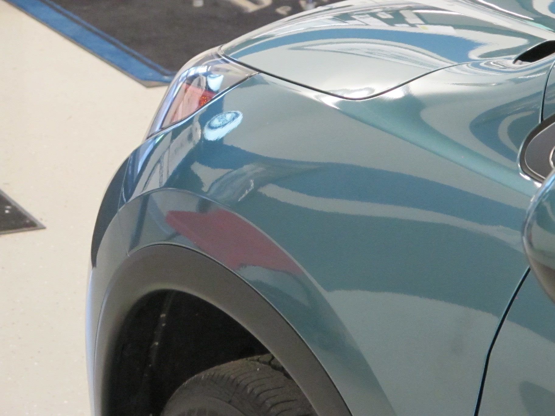 A close up of the fender of a car