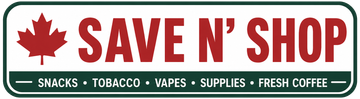 Save N’ Shop sign with red maple leaf, bold red lettering, and green border listing snacks, tobacco, vapes, supplies, fresh coffee