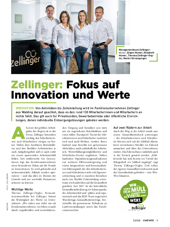 Four people, standing in front of a logo, with text 