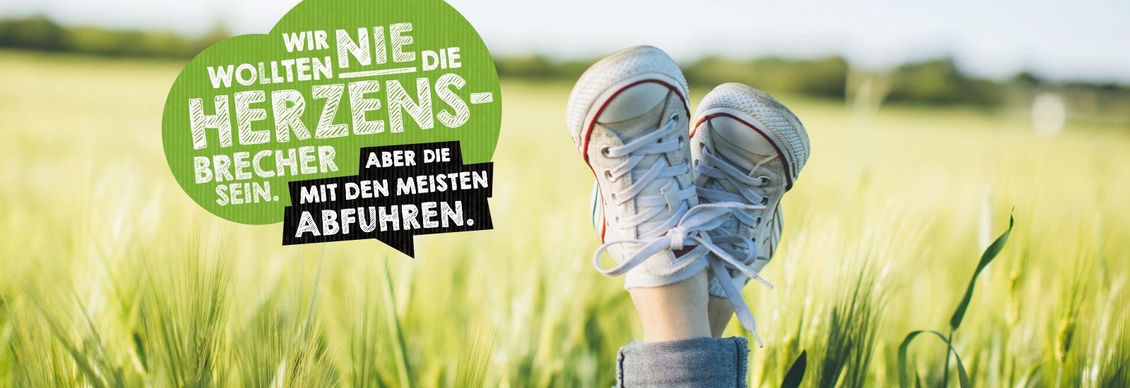 Person wearing white sneakers in a wheat field. Speech bubble with text