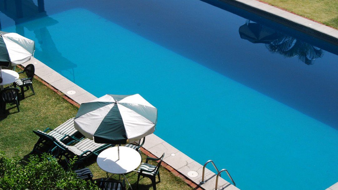Pool with umbrellas Table