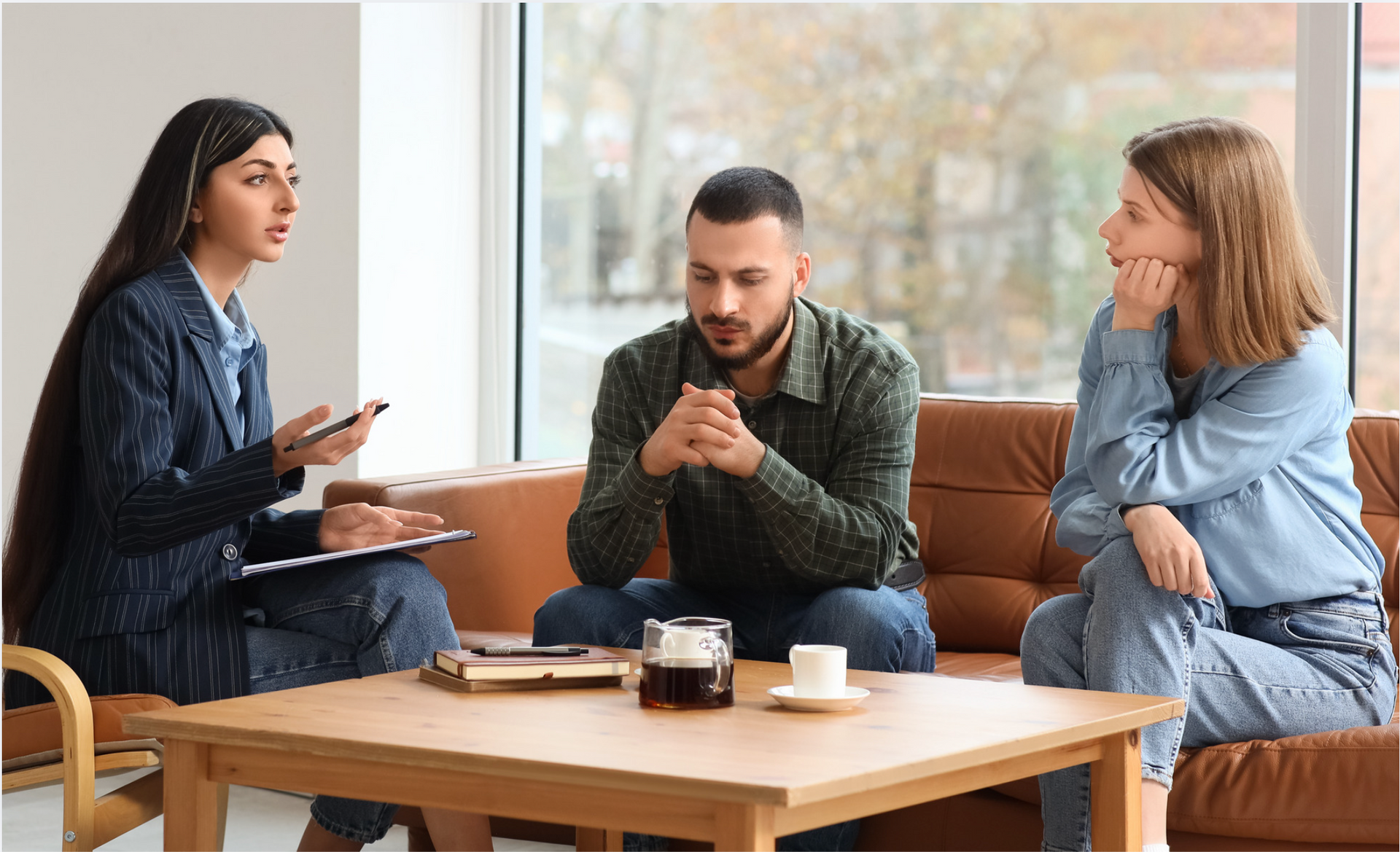 Court mediation meeting with legal documents, gavel, and scales of justice on a wooden desk. Court mediation meeting with legal documents, gavel, and scales of justice on a wooden desk.