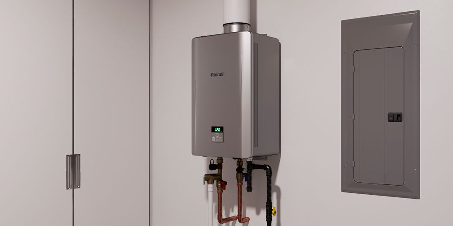 Water heater and water filtration system in a tiled utility room.