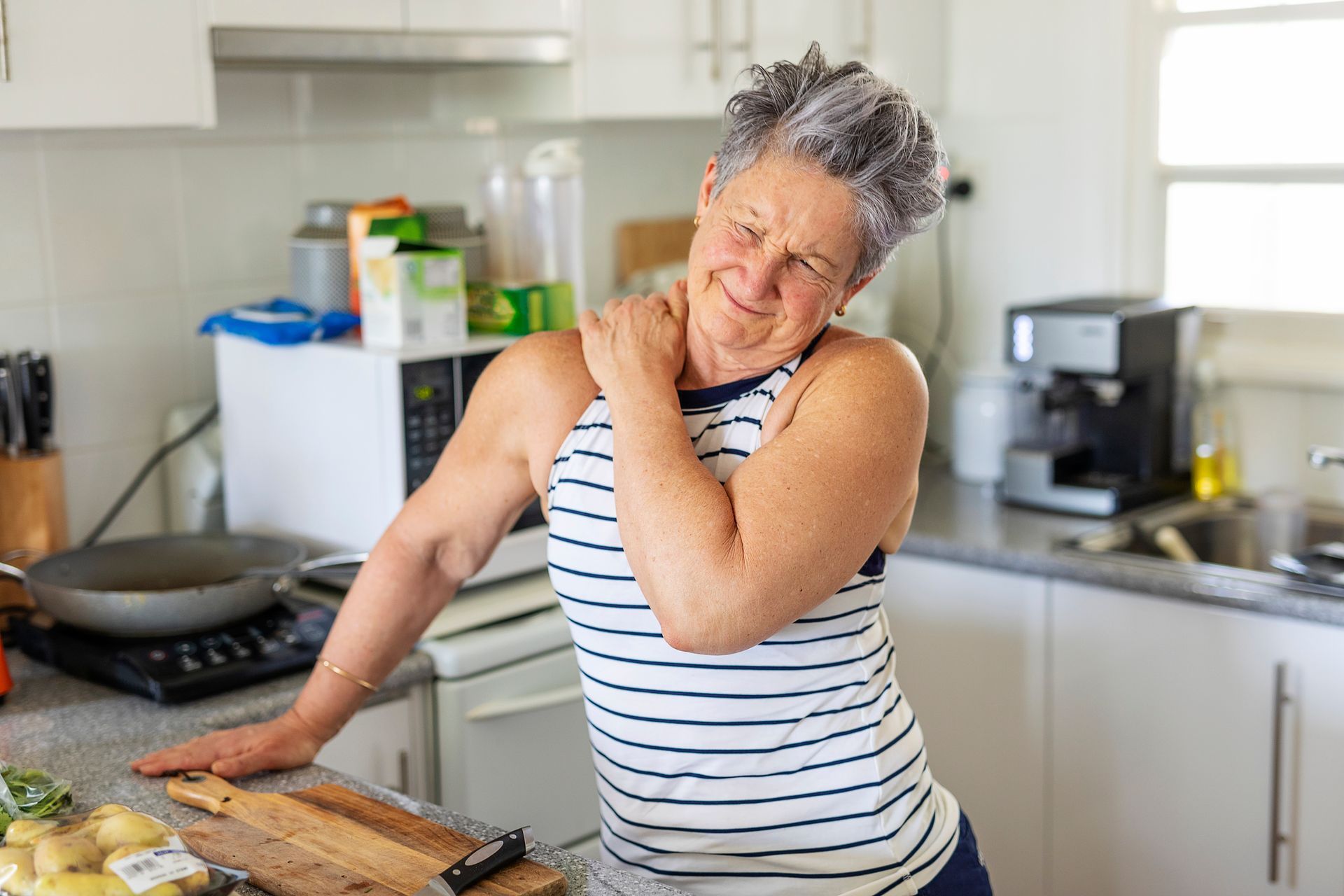 Old Woman Having Neck Pain — Penrith, NSW — Physiotherapy West