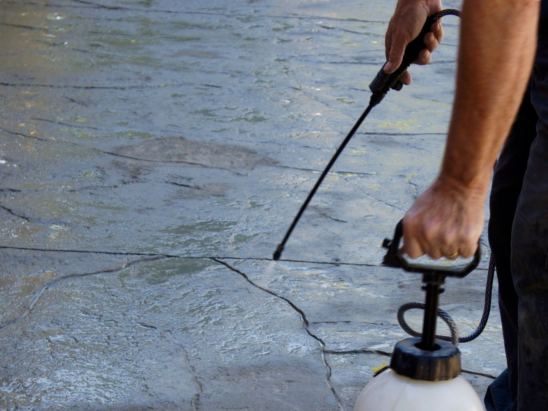 concrete repair prep with a sprayer