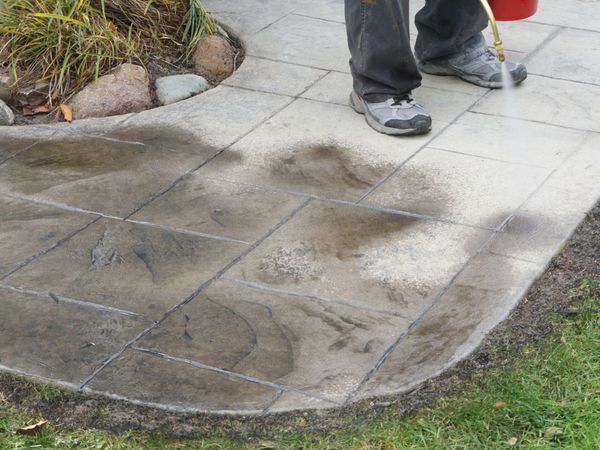 working on a stamped concrete patio in Ottawa