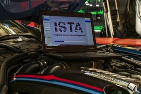 Diagnostic Laptop Connected To Vehicle Engine | Reeder's Auto & Tire Blog