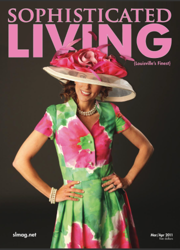 A woman in a floral dress and a large, pink-trimmed hat smiles on the cover of Sophisticated Living magazine.