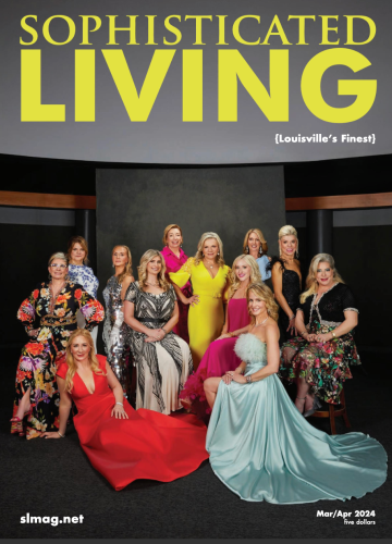 Twelve individuals in formal evening wear pose against a black studio backdrop on a Sophisticated Living magazine cover.