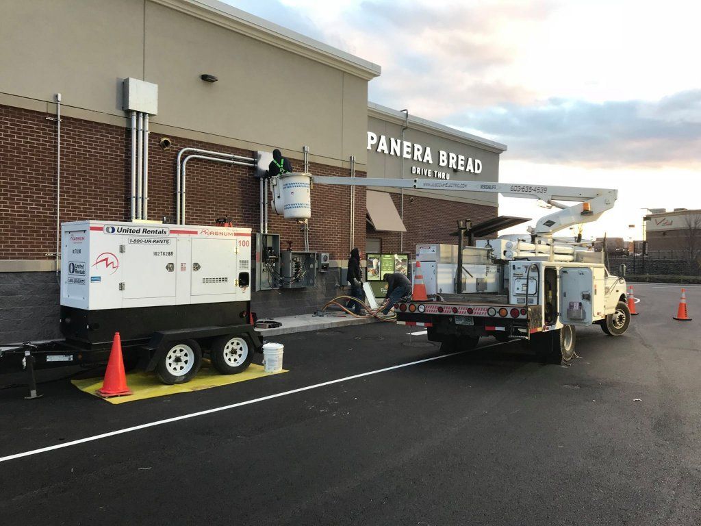 Bucket Truck Near Panera Bread Building — Pelham, NH — Jusczak Electric