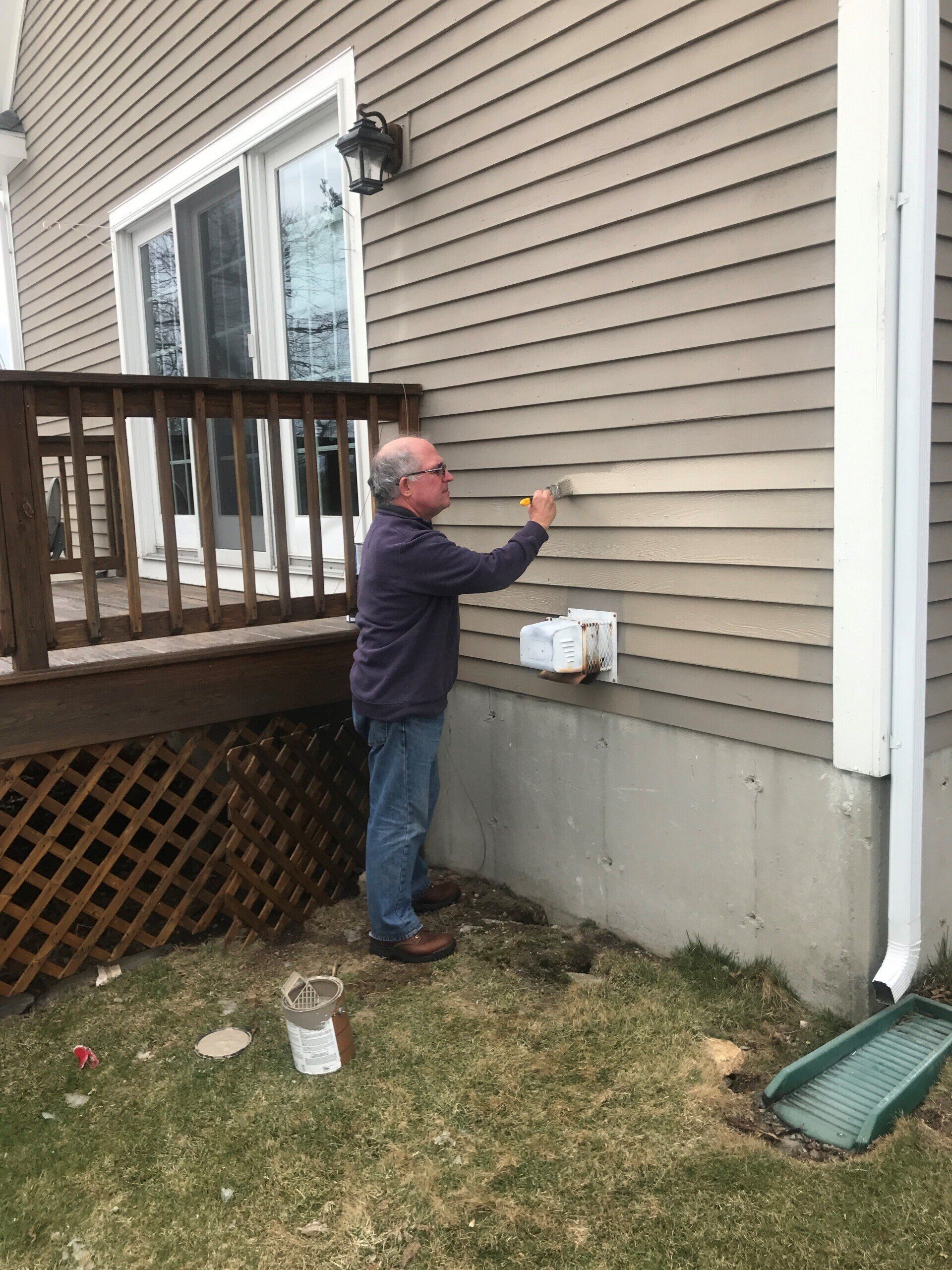 Man Painting — Beverly, MA — GLENN BATTISTELLI CONSTRUCTION, LLC