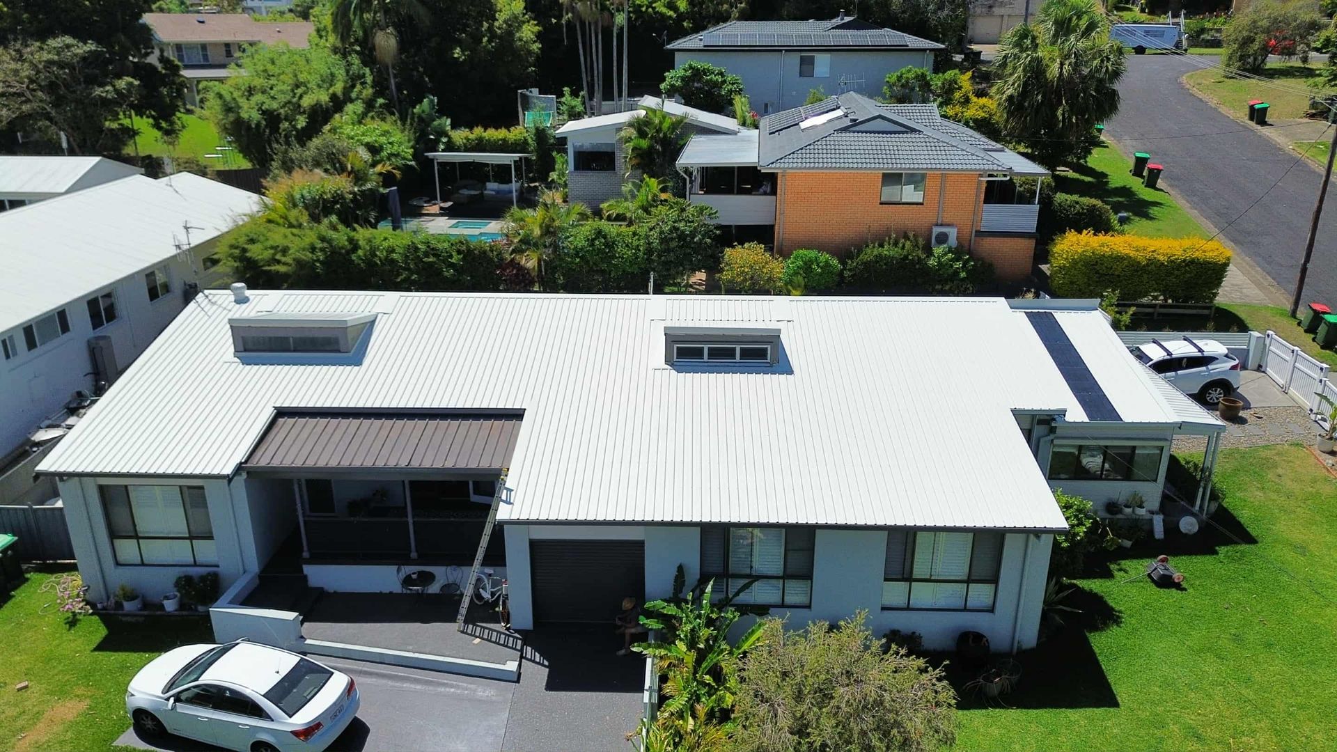 An Aerial View of a House With a Roof That is Being Built — Tim Leach Metal Roofing in Wauchope, NSW