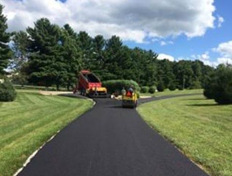 Clean Asphalt Road - Asphalt Paving Contractors in Tomball,, TX