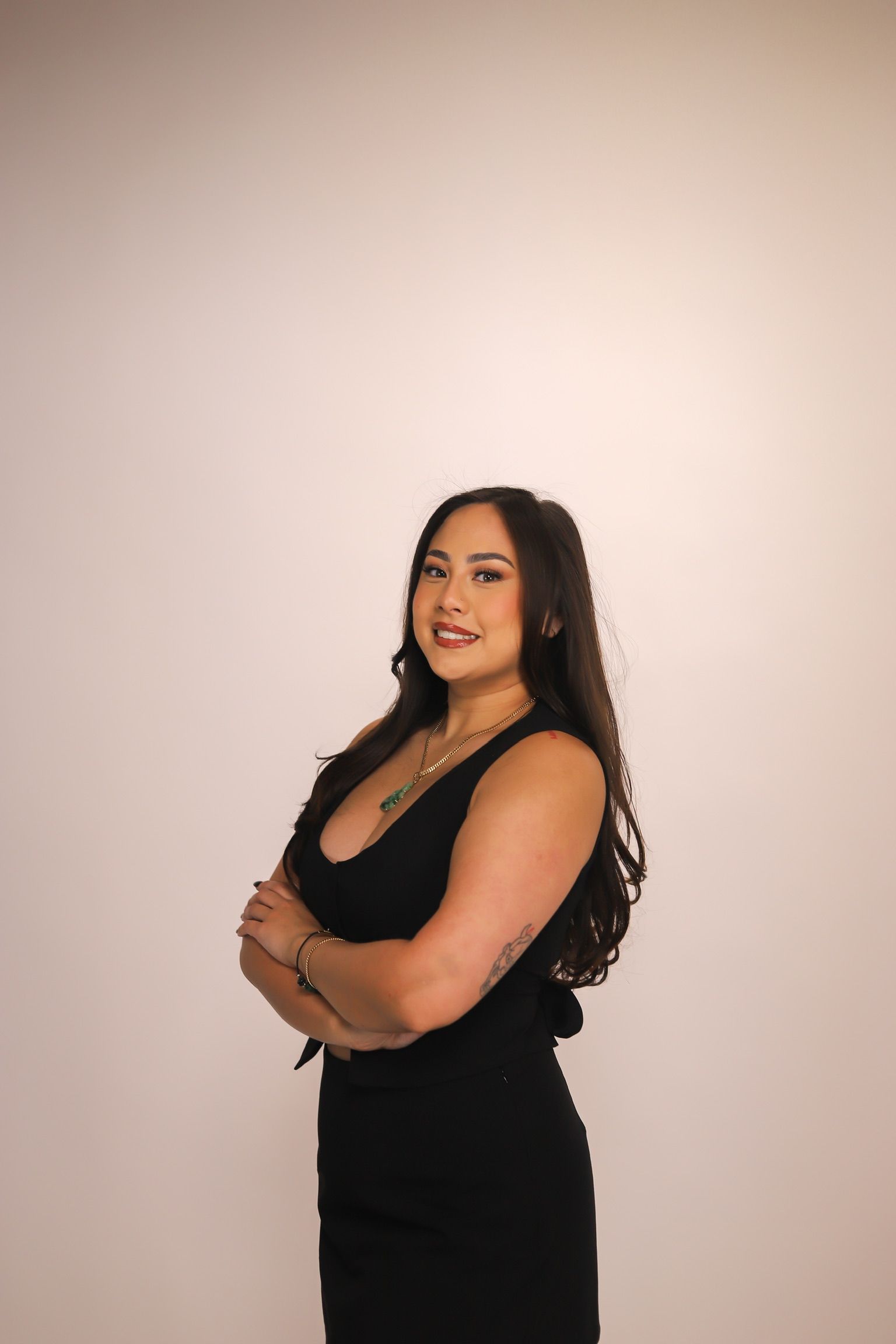 Close-up of eye and eyebrow during waxing. Wax applied with a spatula, skin visible, brown eyes.