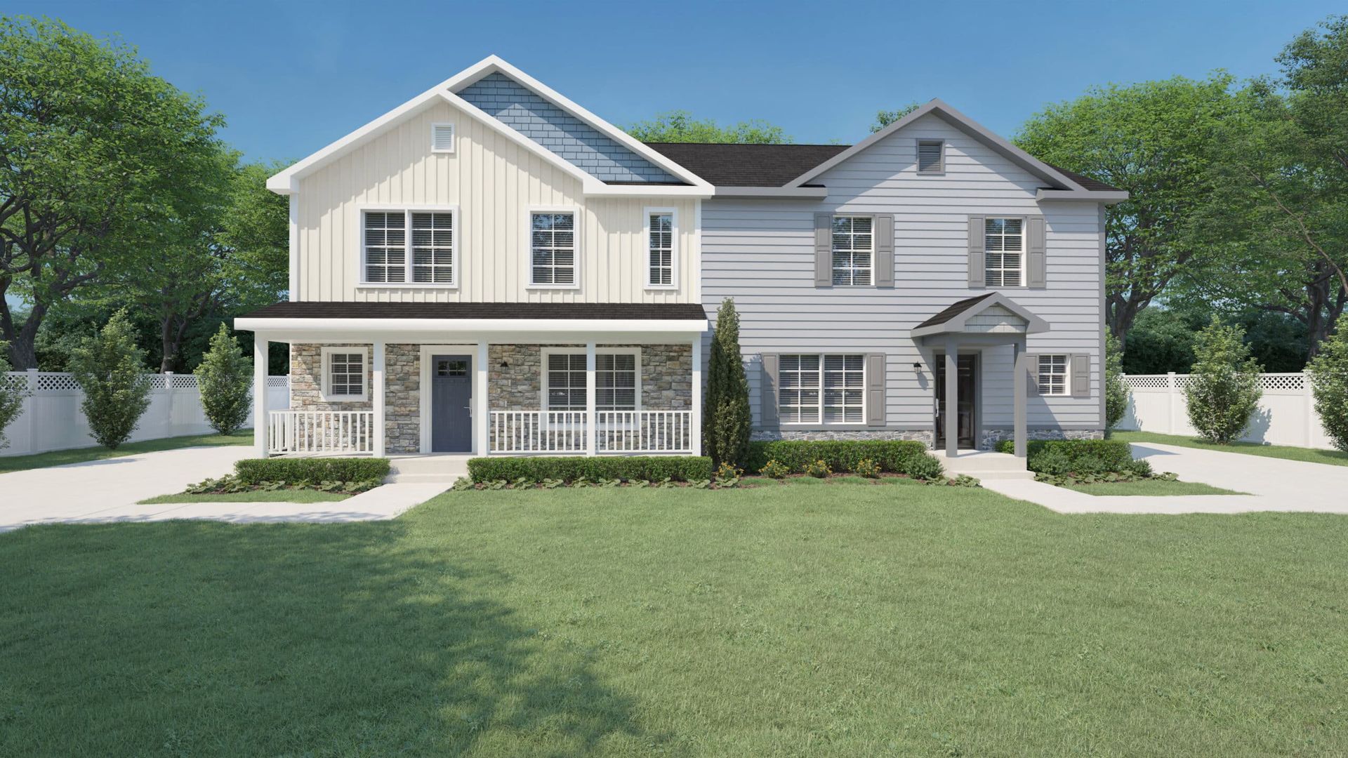 A couple of houses are sitting next to each other on a lush green lawn.