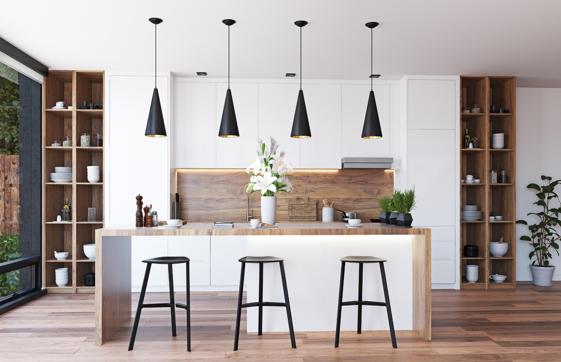 A modern kitchen with white cabinets , wooden counter tops , and stools.