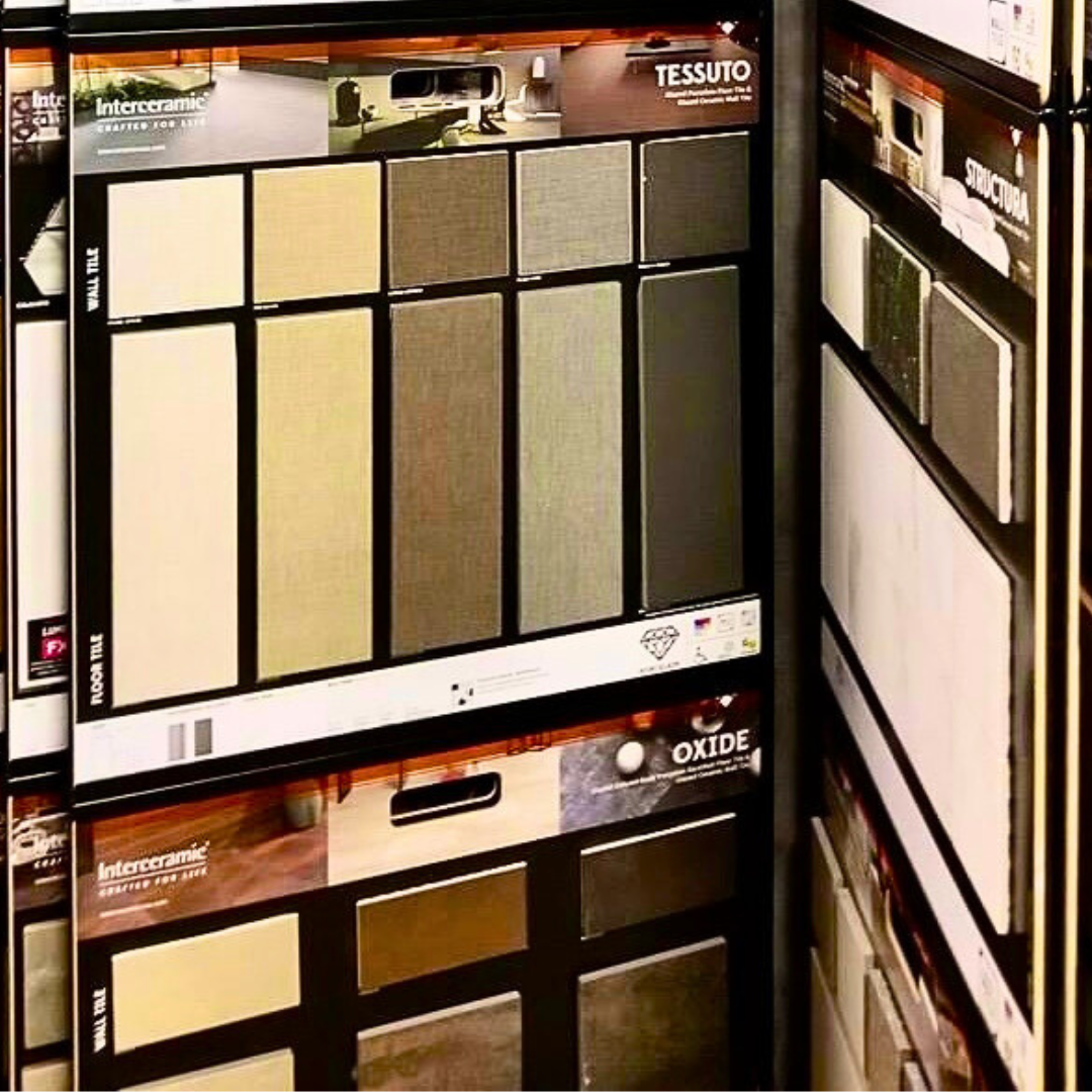 Displays of tile samples in various neutral colors.