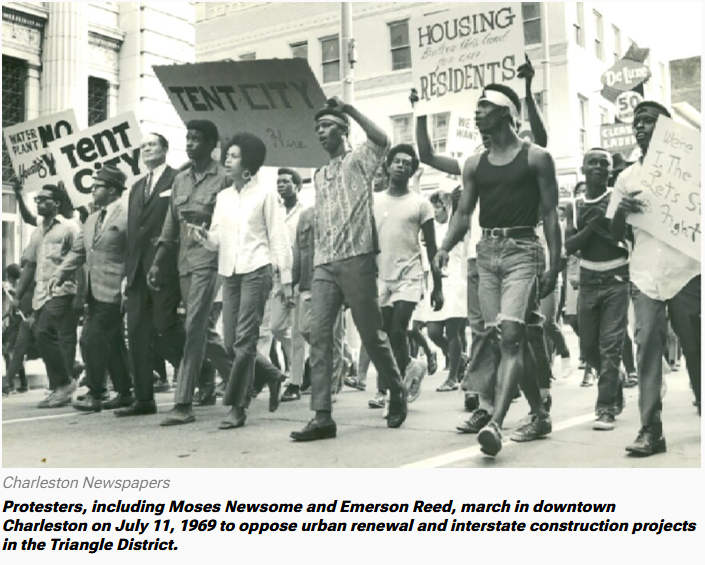 Protest march in Charleston, 1969, against urban renewal. Signs read
