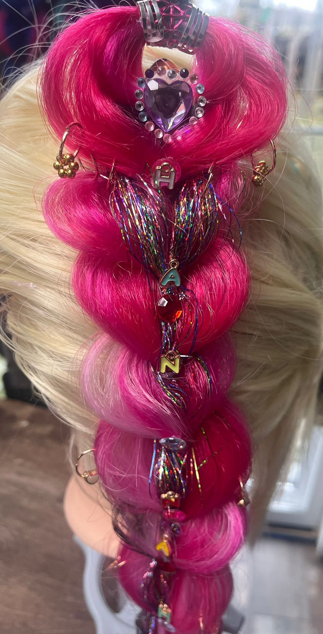 RUMI roze vlecht met glitters en versiering