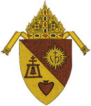 Ecclesiastical coat of arms with a miter above a shield divided diagonally, featuring a bell, IHS symbol, and a heart.